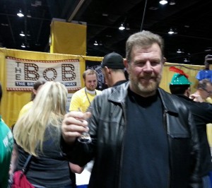 Bob appreciating a taste from a well-named brewery.