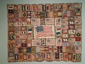 Lucky for me, there was a special showing of quilts from the Colorado State Historical Society. This one is made of inserts from cigarette packages. Very unique and quite eye-catching.